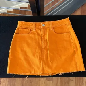 L’AGENCE Delma Denim Mini Skirt in Tangerine Orange