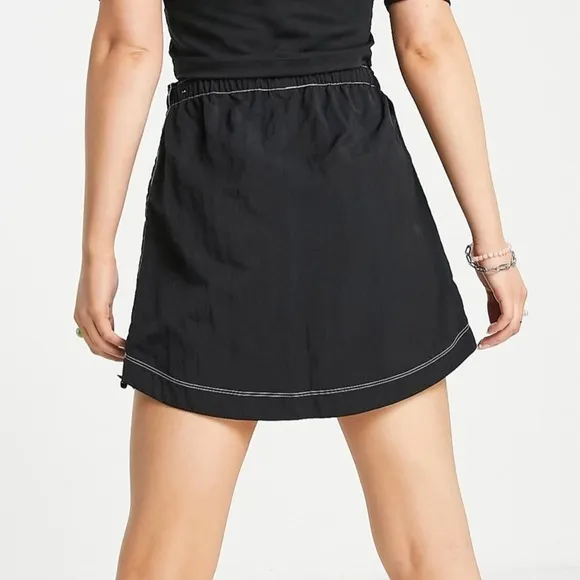 NWT Nike Swoosh woven high-waisted mini skirt in black