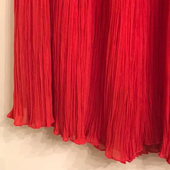 Orange pleated skirt