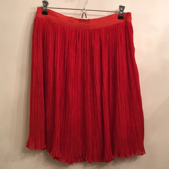 Orange pleated skirt